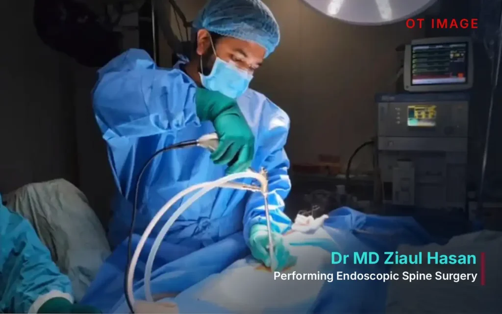 Dr MD Ziaul Hasan - Performing Endoscopic Spine Surgery - OT image
